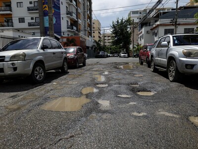 Residentes de la Zona Universitaria piden reparación urgente de calles deterioradas